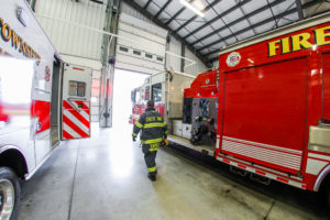 Crete Township Fire Protection District Fire Fighter Walking Through Fire House